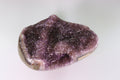 Amethyst crystal on a white background