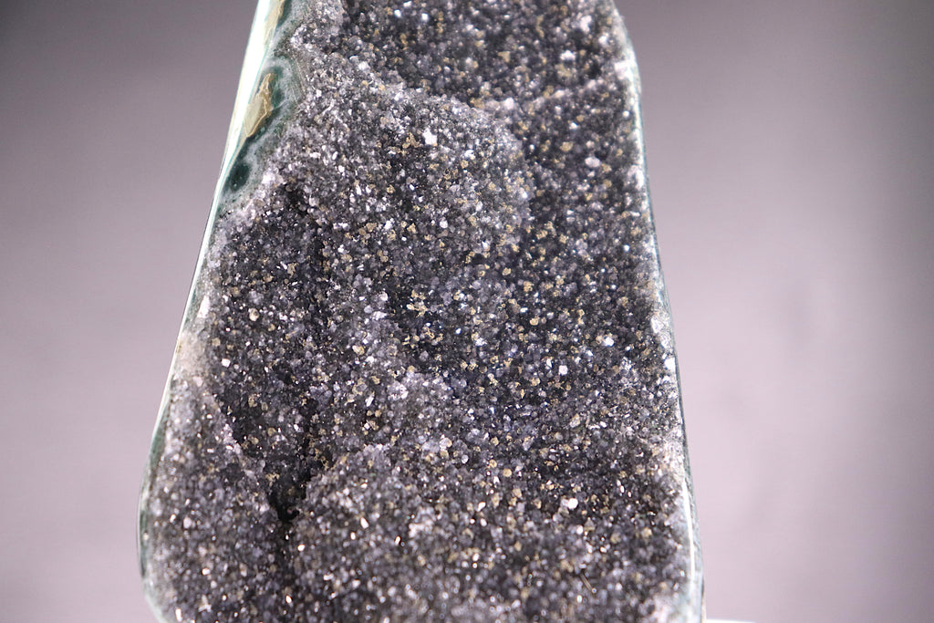 Close-up of a Black Amethyst Cut base  with a gradient background