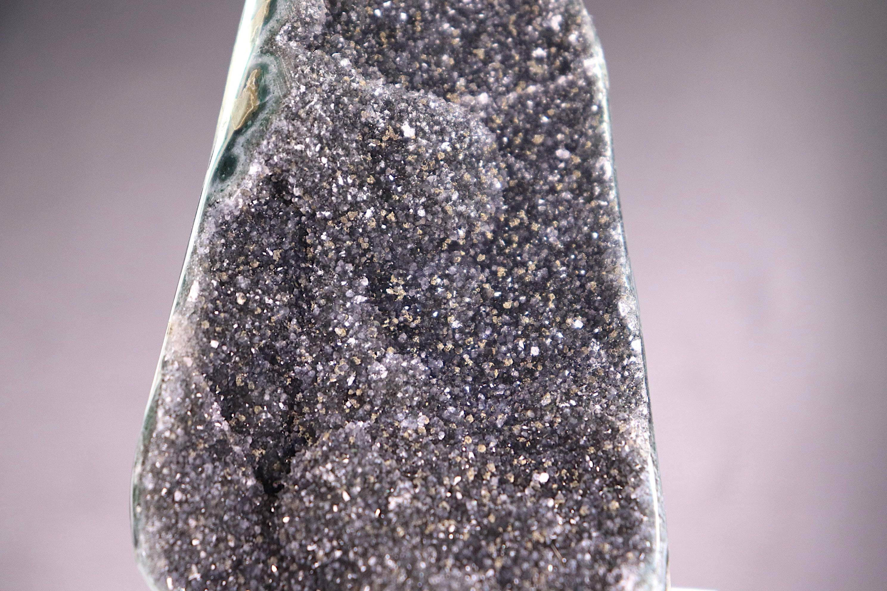 Close-up of a Black Amethyst Cut base  with a gradient background