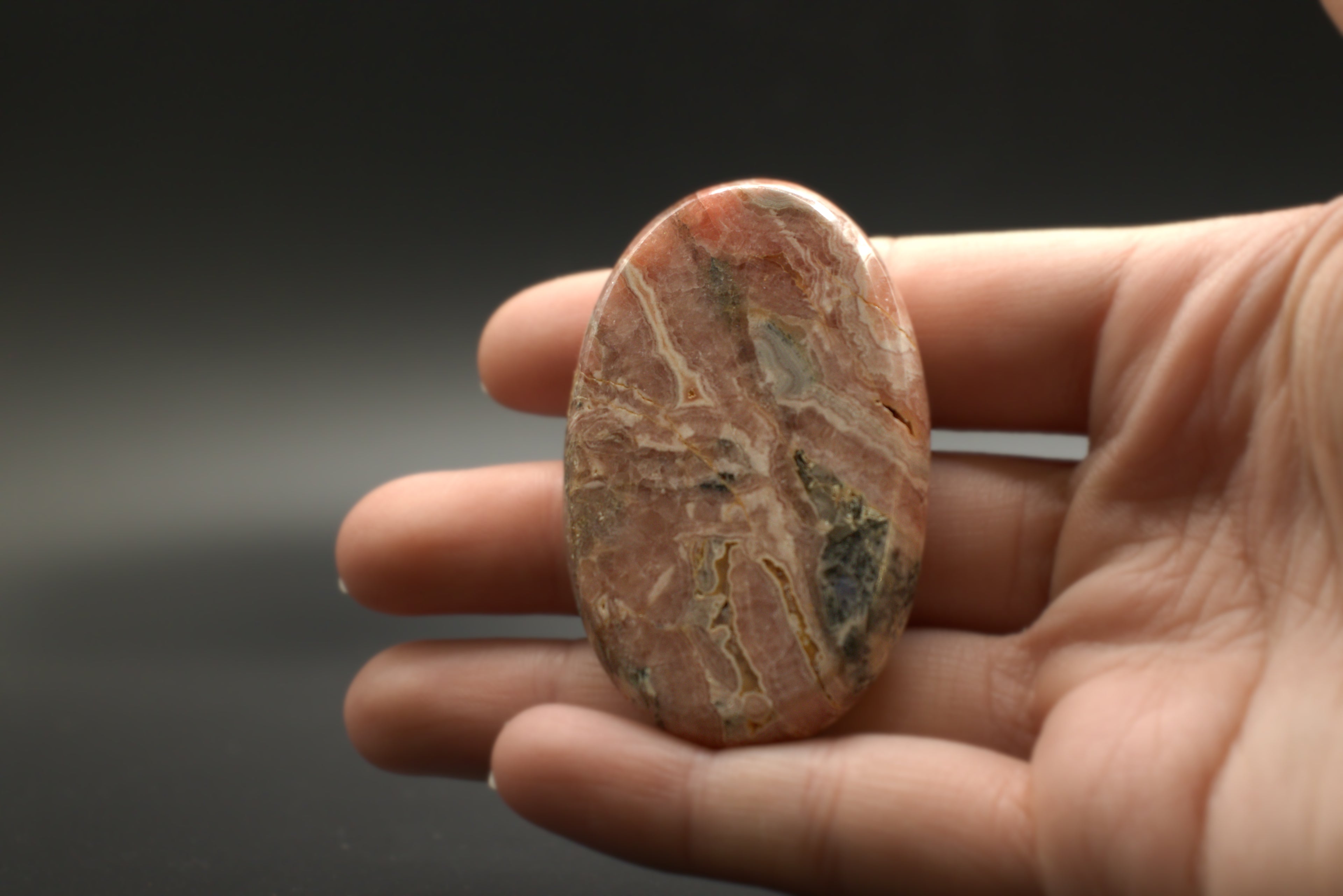 Rhodochrosite worry stone