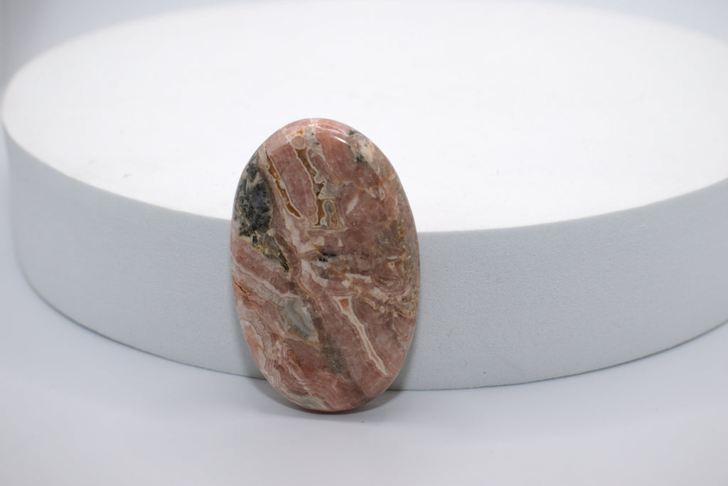 Rhodochrosite worry stone