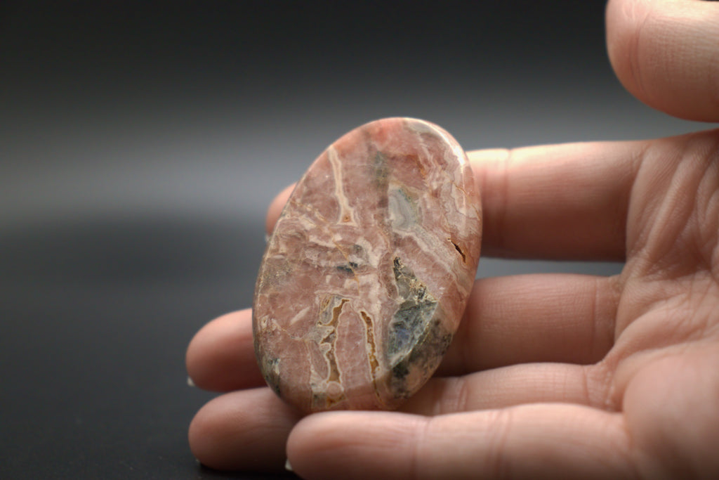 Rhodochrosite worry stone