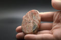 Rhodochrosite worry stone